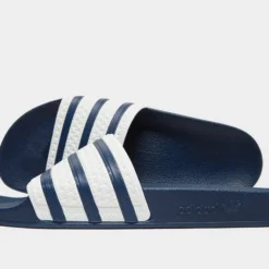 Adidas Originals Adilette Sliders In Blue And White