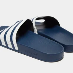 Adidas Originals Adilette Sliders In Blue And White